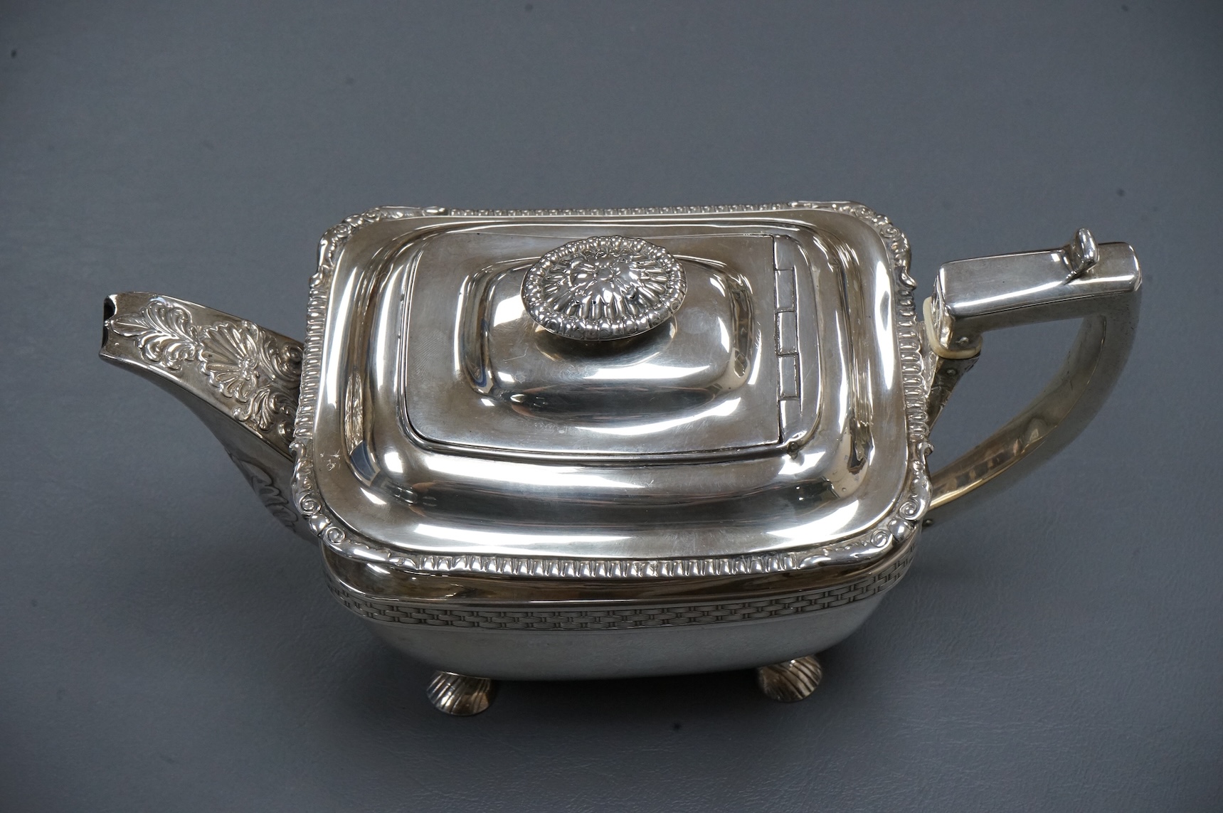 A George III silver oblong teapot by Daniel Pontifex, London, 1809, decorated with 'basket weave' bands, gross weight 26,2oz., CITES Submission reference, 712SNDFP